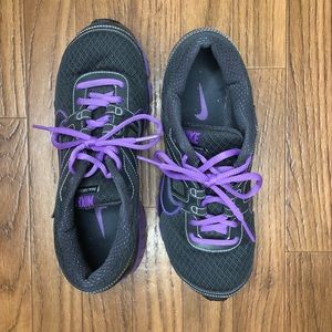 NIKE women’s purple and gray running shoes